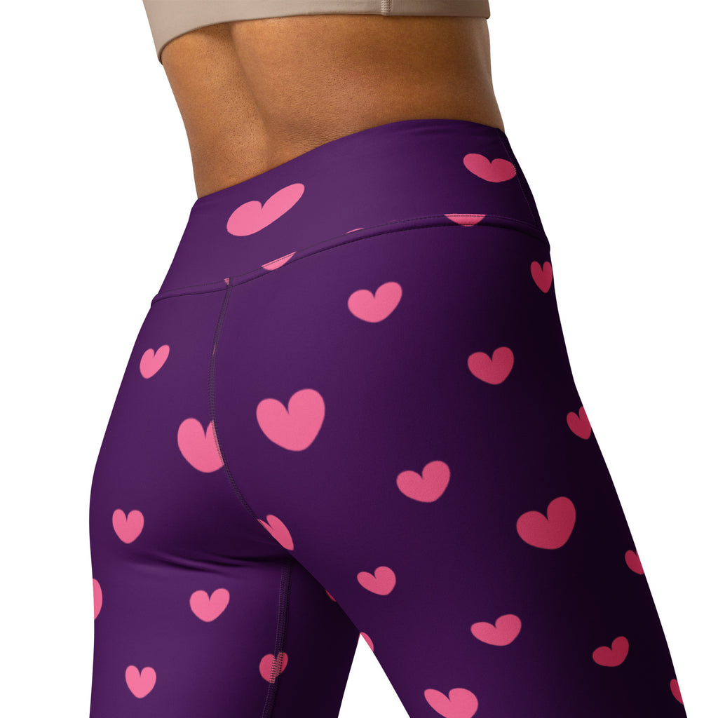 Women’s purple high waisted buttery soft yoga leggings with pink heart patterns and quick drying fabric