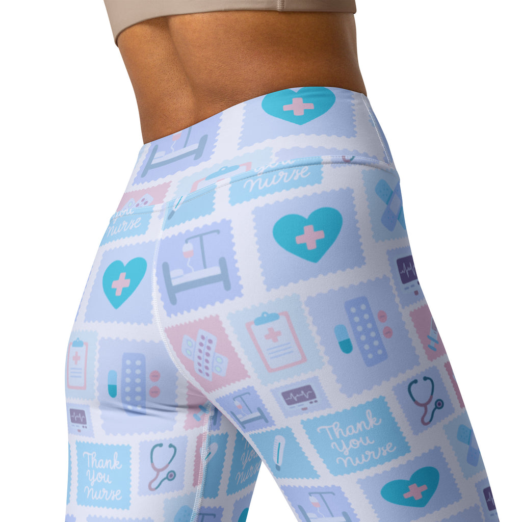 Women’s light blue and pink high waisted buttery soft yoga leggings with medical heart stethoscope nurse designs