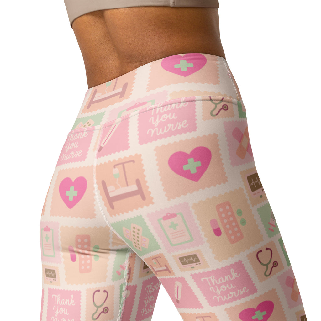 Women’s pink nurse icon buttery soft yoga leggings with medical heart stethoscope pattern and thank you nurse text