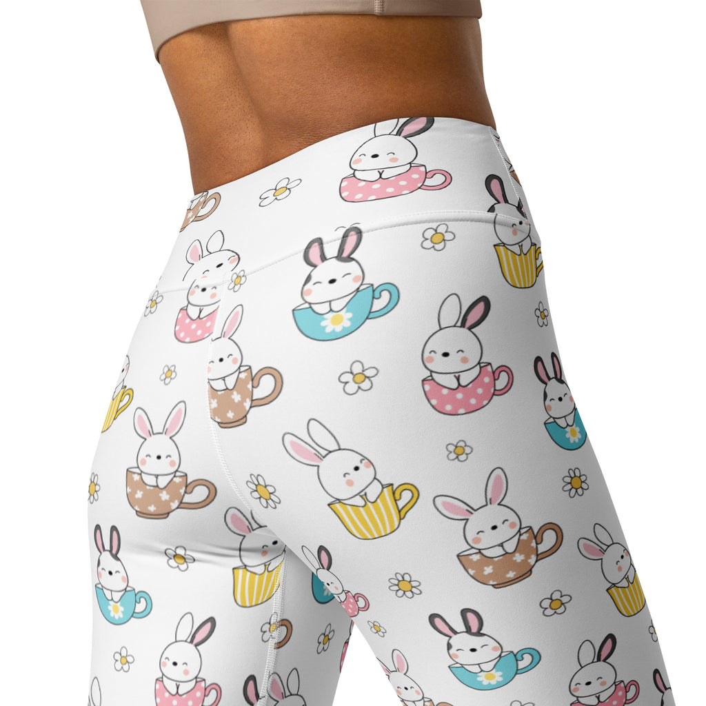 White buttery soft high waisted yoga leggings with playful cartoon bunnies in teacups and small daisies pattern