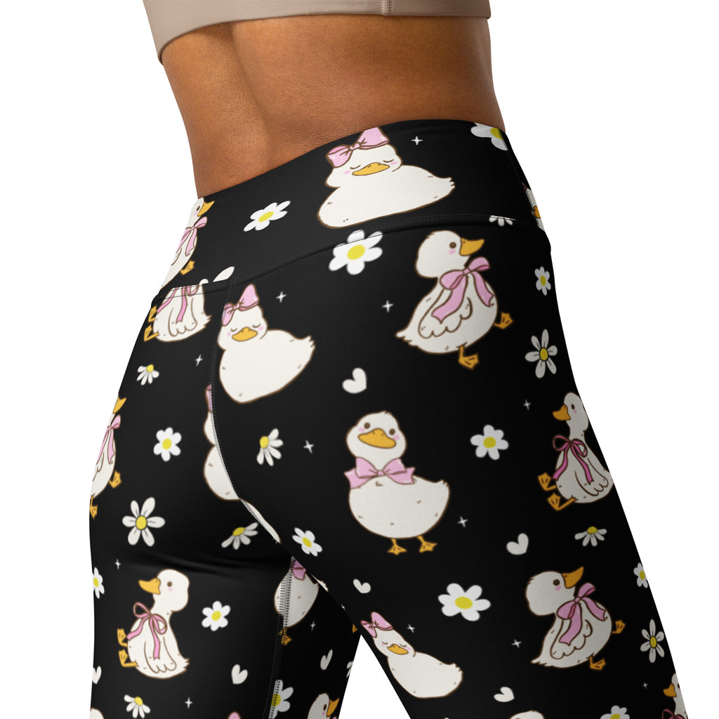 Women’s black high waisted buttery soft yoga leggings with white ducks pink bows daisies and hearts quick drying