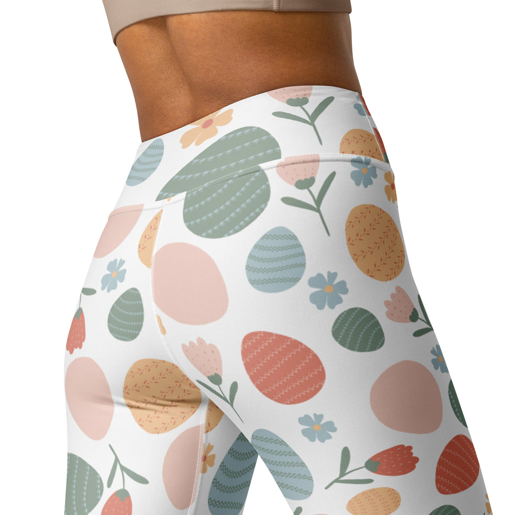 White high-waisted buttery soft yoga leggings with pastel easter egg and floral pattern quick drying comfort