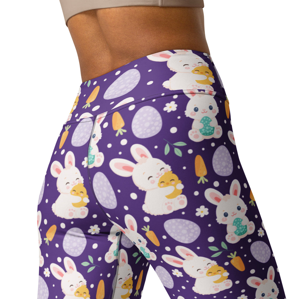Women’s purple high waisted Easter bunny buttery soft yoga leggings with white bunnies holding yellow chicks and pastel eggs