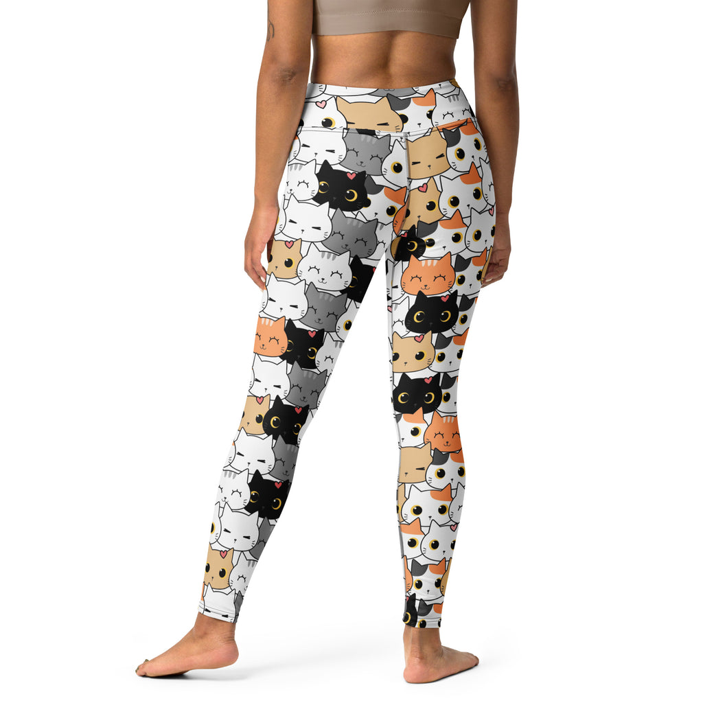 White buttery soft women’s yoga leggings with playful multicolor cartoon cat face pattern
