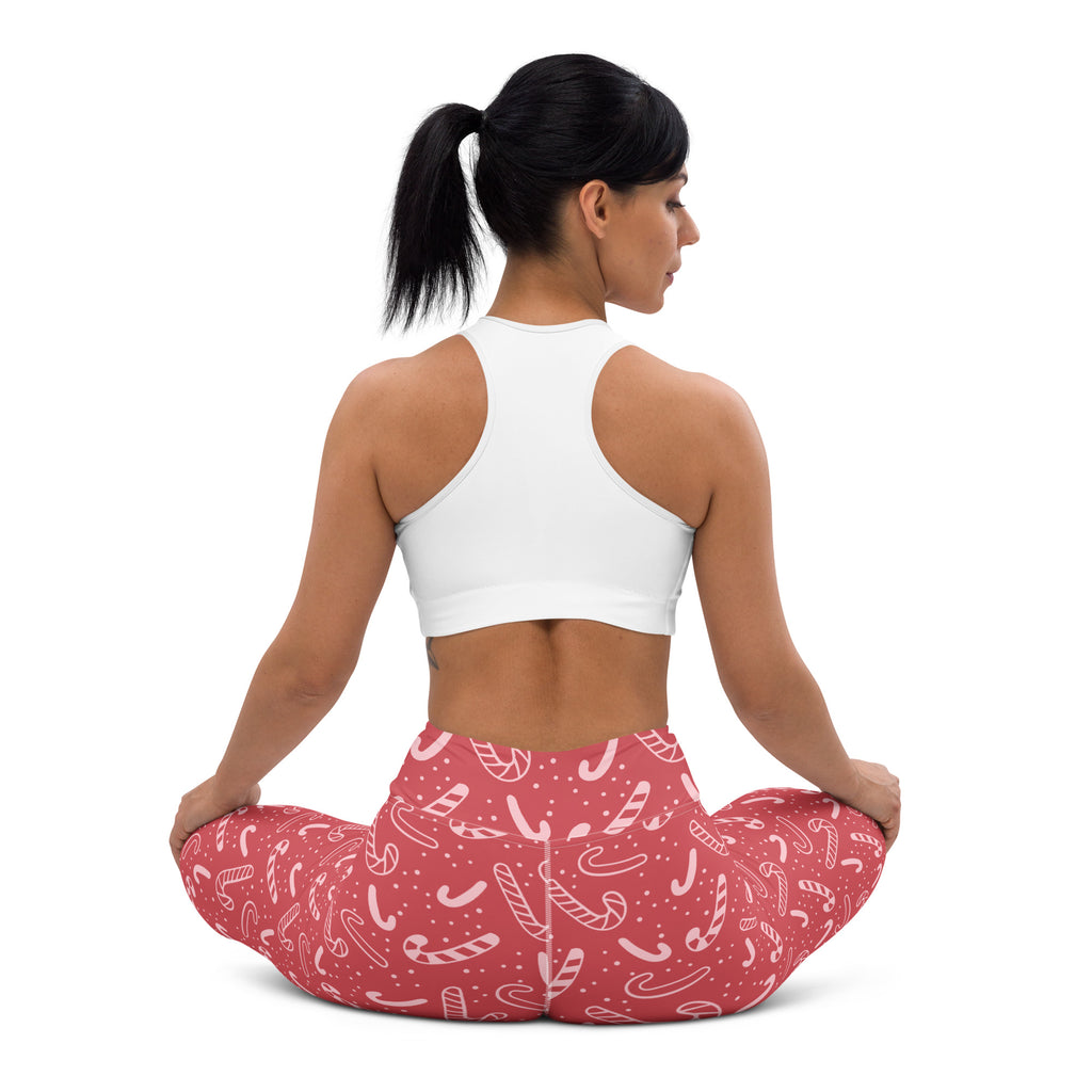 Women’s red buttery soft yoga leggings with white candy cane pattern perfect for christmas workouts