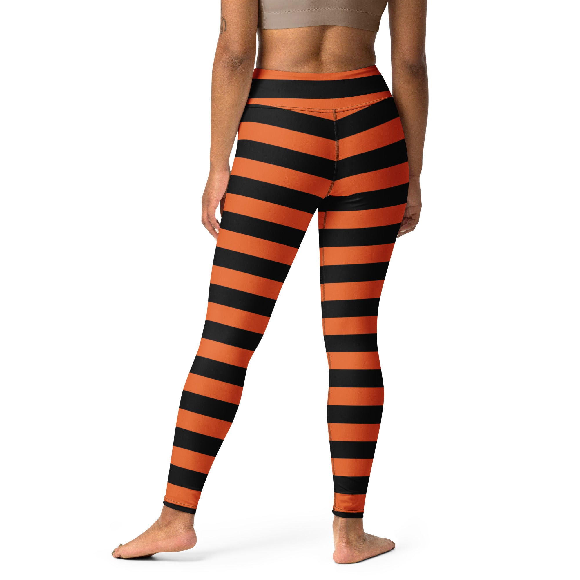 Women’s orange and black striped high-waisted buttery soft yoga leggings for halloween with horizontal stripes