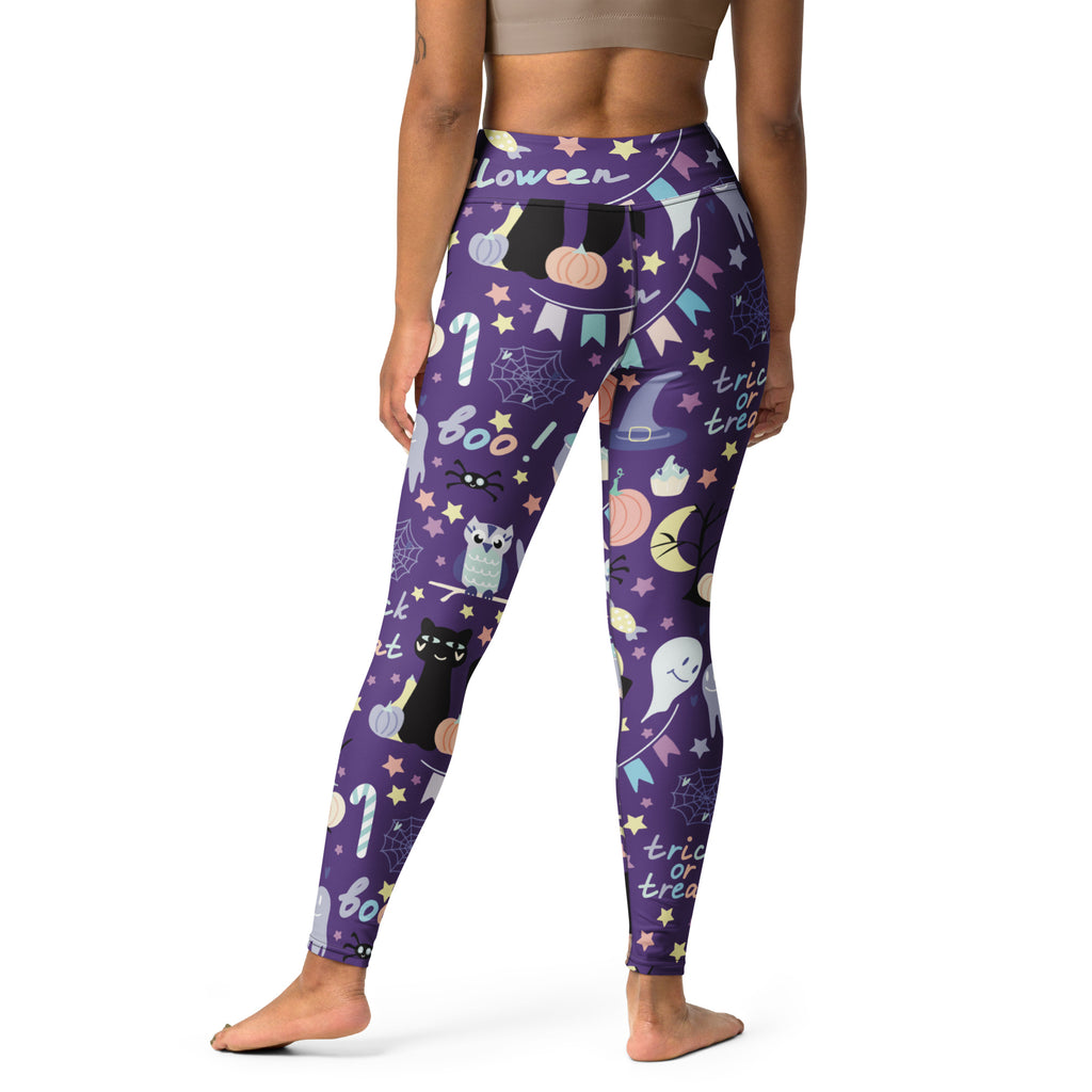 Women’s spooky halloween buttery soft purple leggings with playful cats ghosts pumpkins and festive trick or treat text