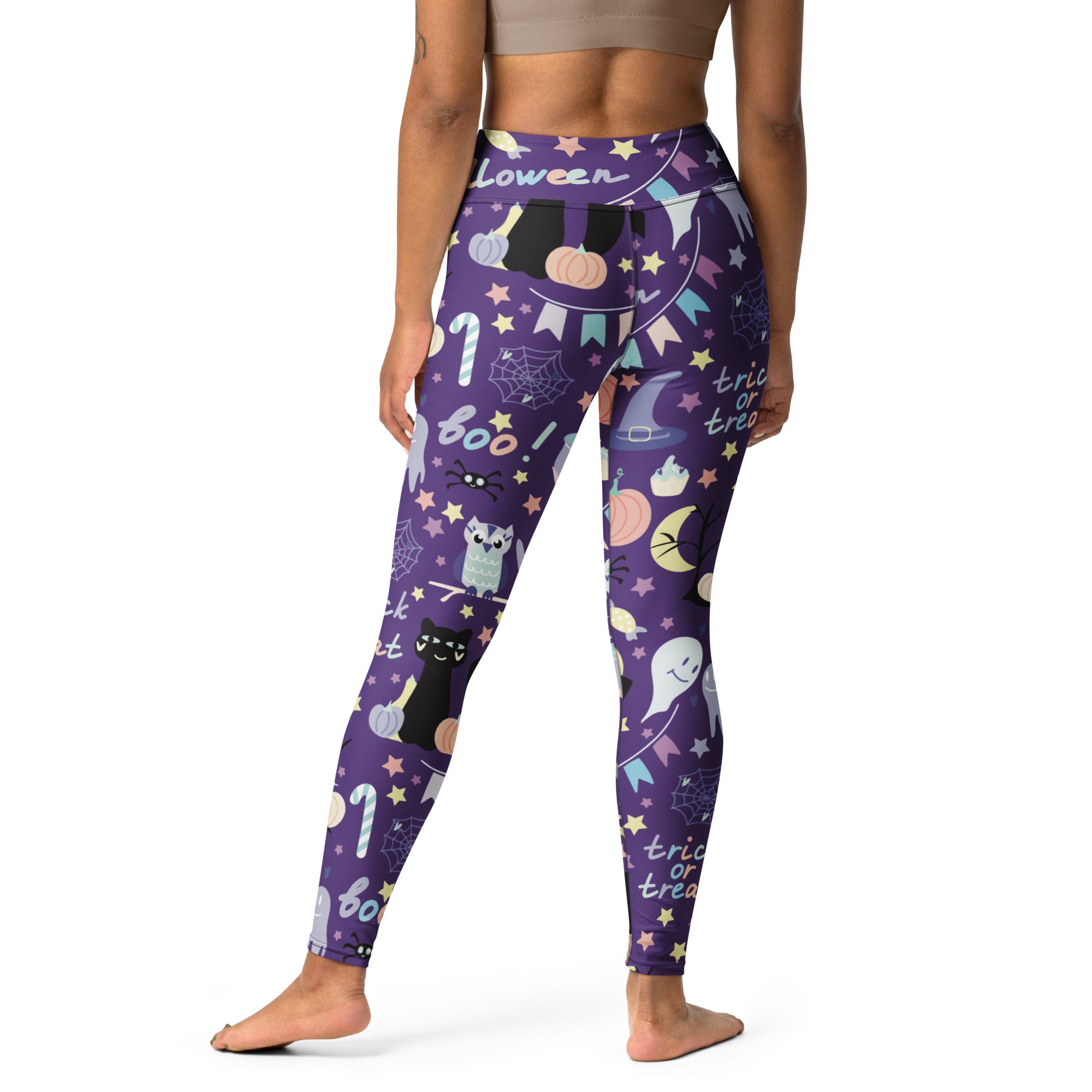 Women’s spooky halloween buttery soft purple leggings with playful cats ghosts pumpkins and festive trick or treat text