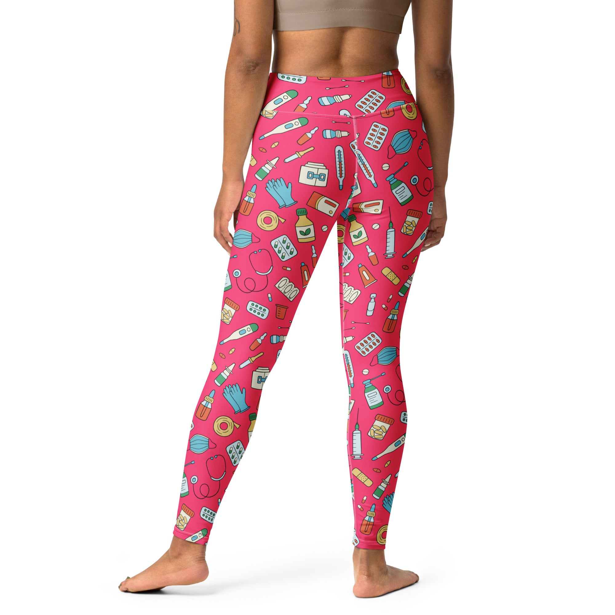Bright pink women’s nurse themed buttery soft high-waisted yoga leggings with blue green and white medical illustrations