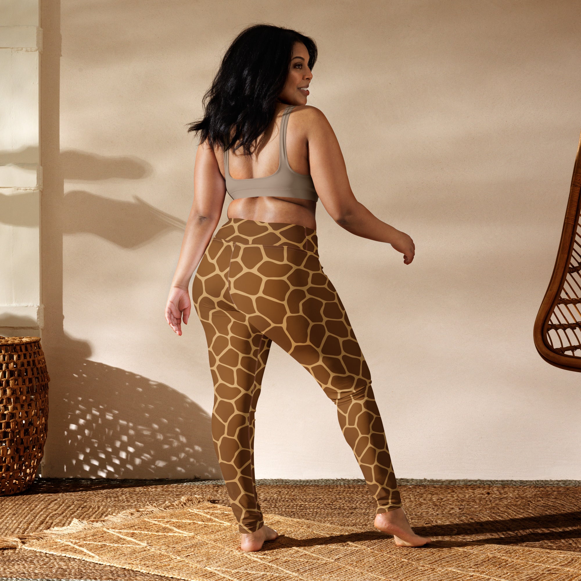 Women’s giraffe print buttery soft yoga leggings in brown with a high-waisted snug form-fitting design