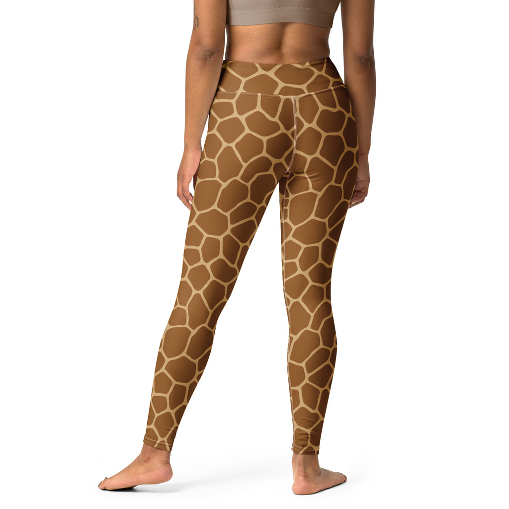 High-waisted women’s giraffe print yoga leggings in tan and brown tones made from stretchy buttery soft fabric