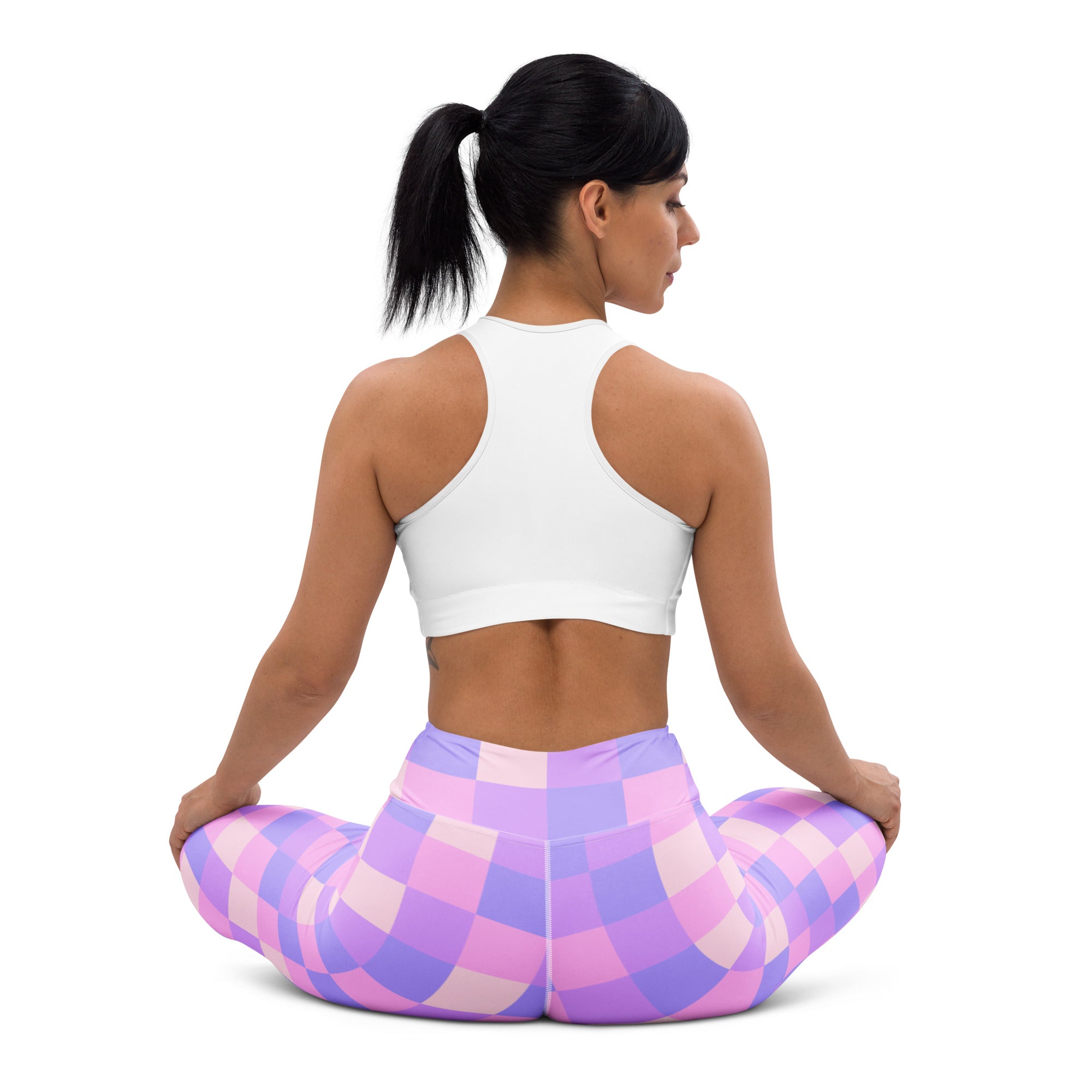 Women’s purple and pink checkered buttery soft yoga leggings shown from the back side