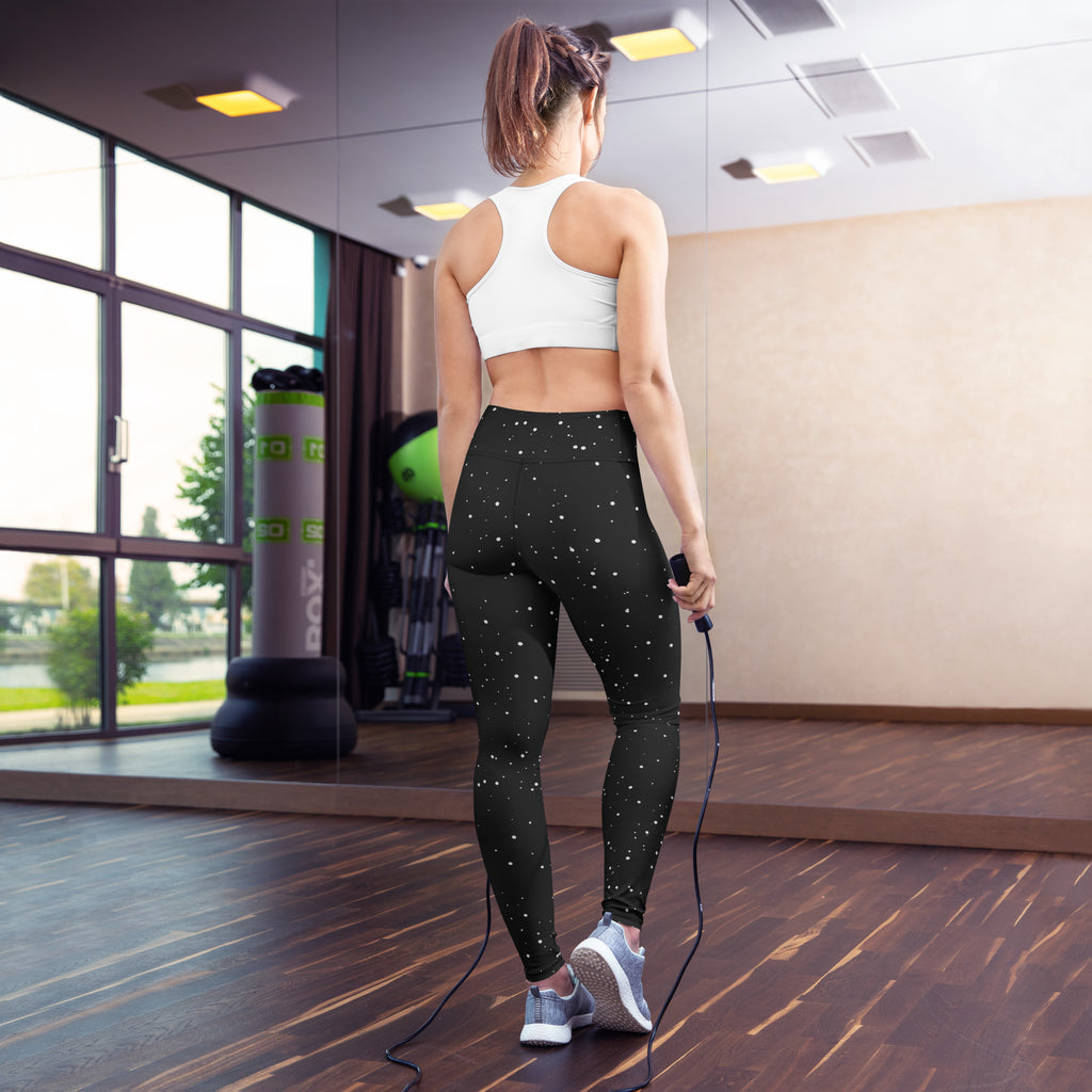 Women’s black buttery soft yoga leggings with white snowflake star patterns for comfortable activewear