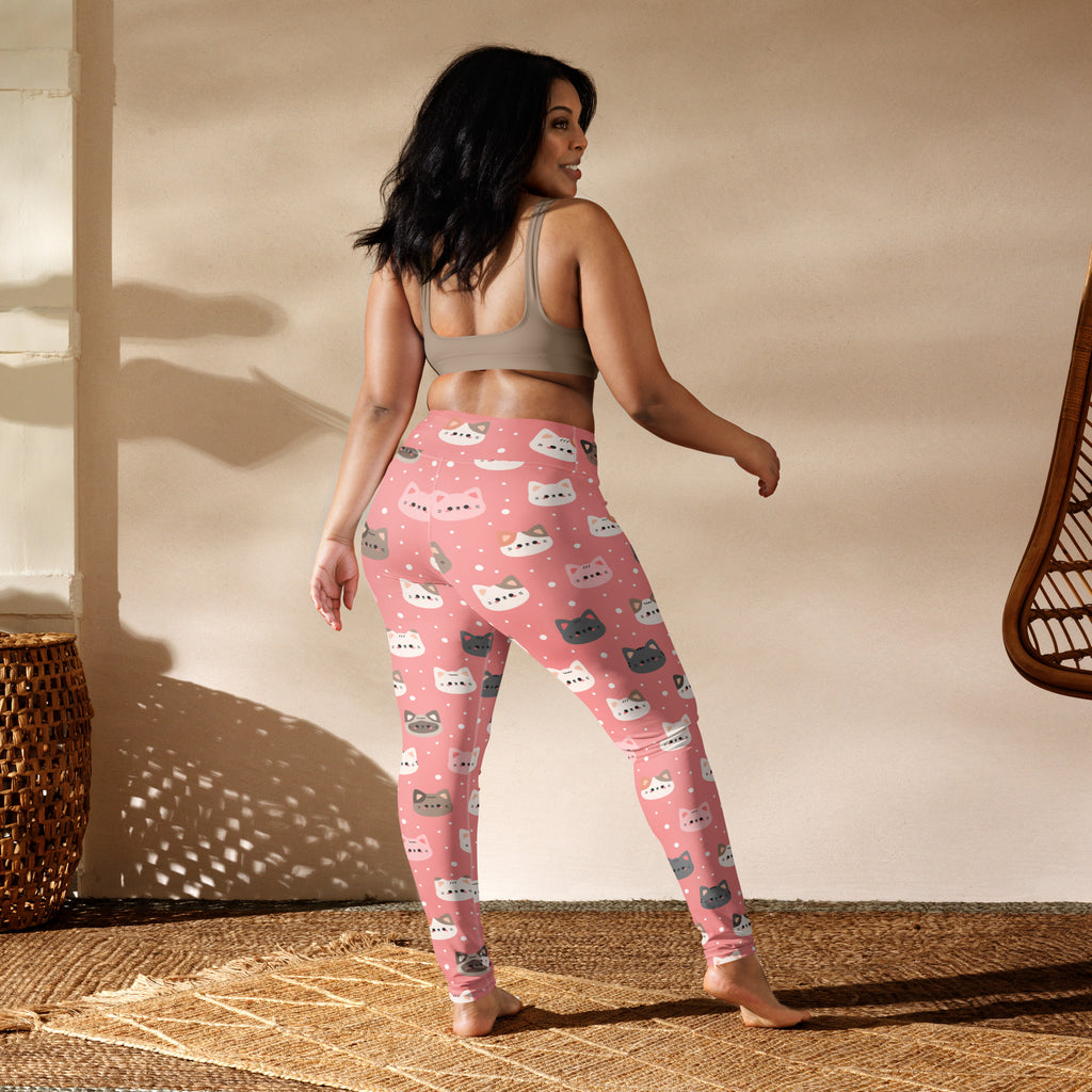 Pink buttery soft yoga leggings for women featuring a playful pattern of white and gray cat faces