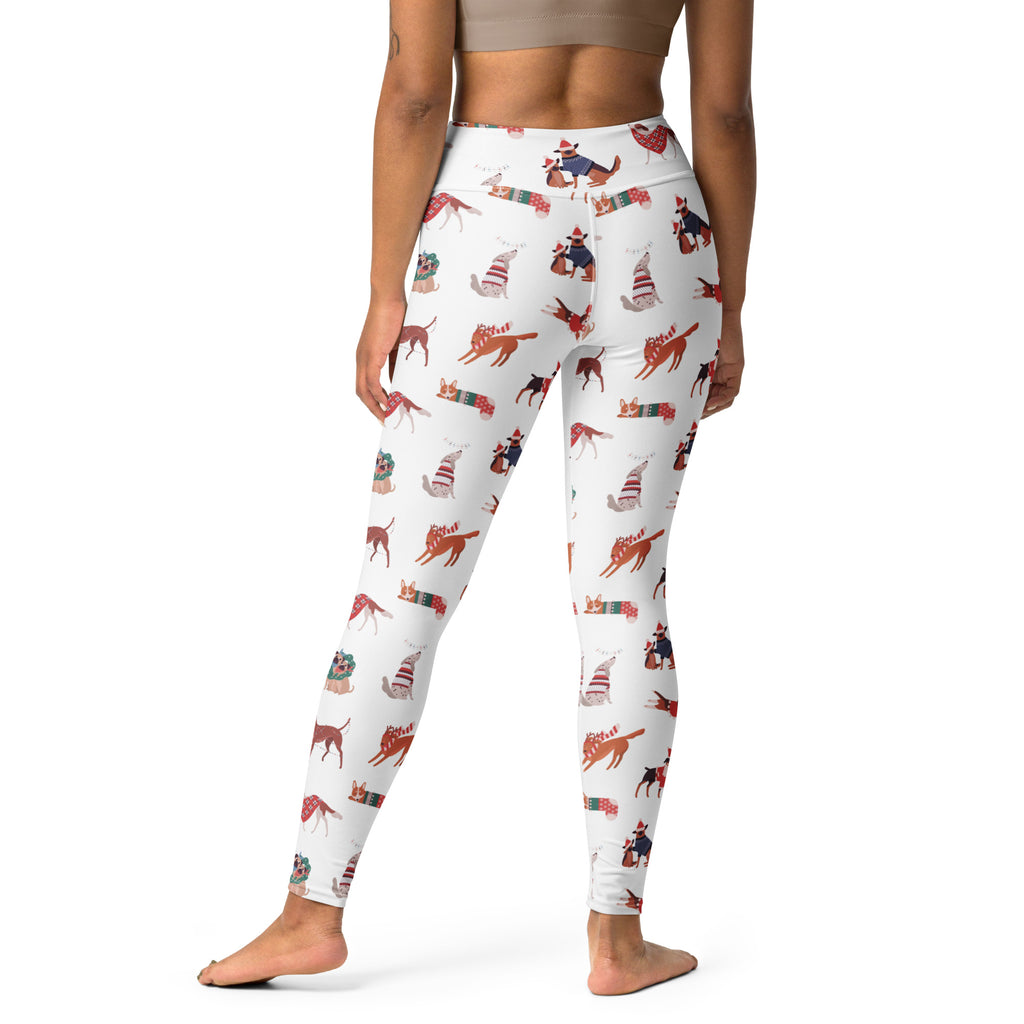 Women’s white buttery soft yoga leggings with festive cartoon dogs in red and blue holiday sweaters and scarves