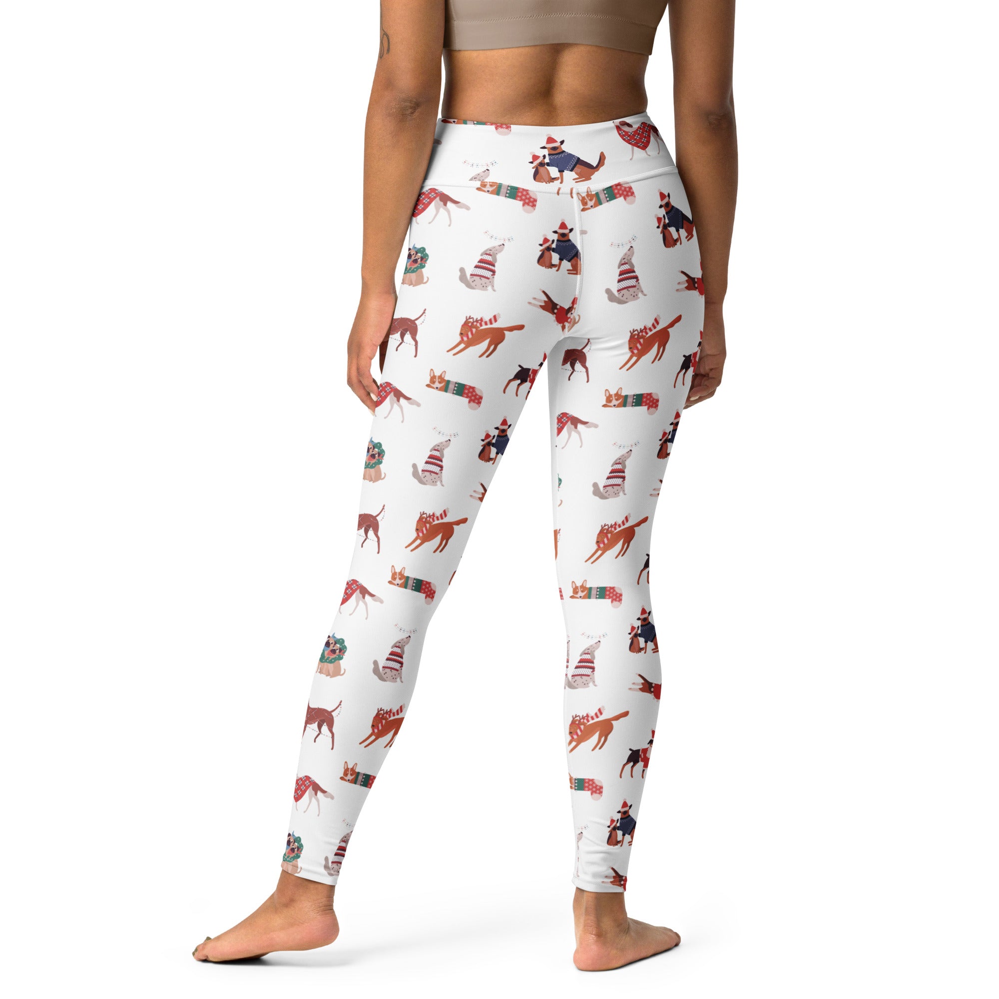 Women’s white buttery soft yoga leggings with festive cartoon dogs in red and blue holiday sweaters and scarves