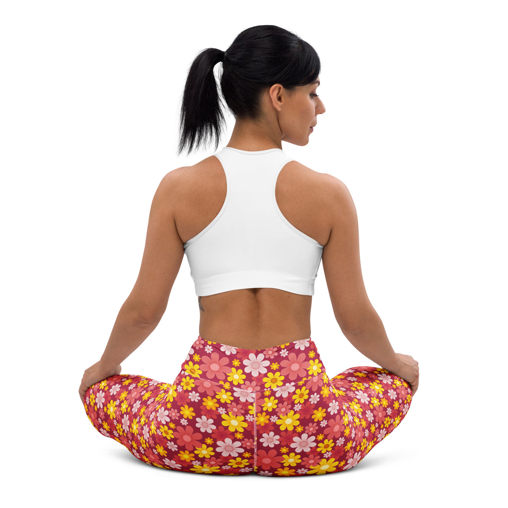 Women’s red floral buttery soft yoga leggings with vibrant pink yellow and white floral pattern and snug fit