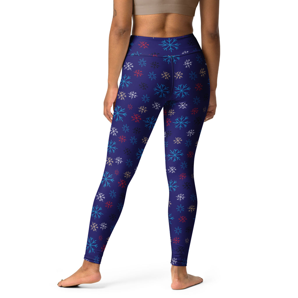 Women’s navy snowflake buttery soft high-waisted leggings with multicolored snowflake pattern for yoga and comfort