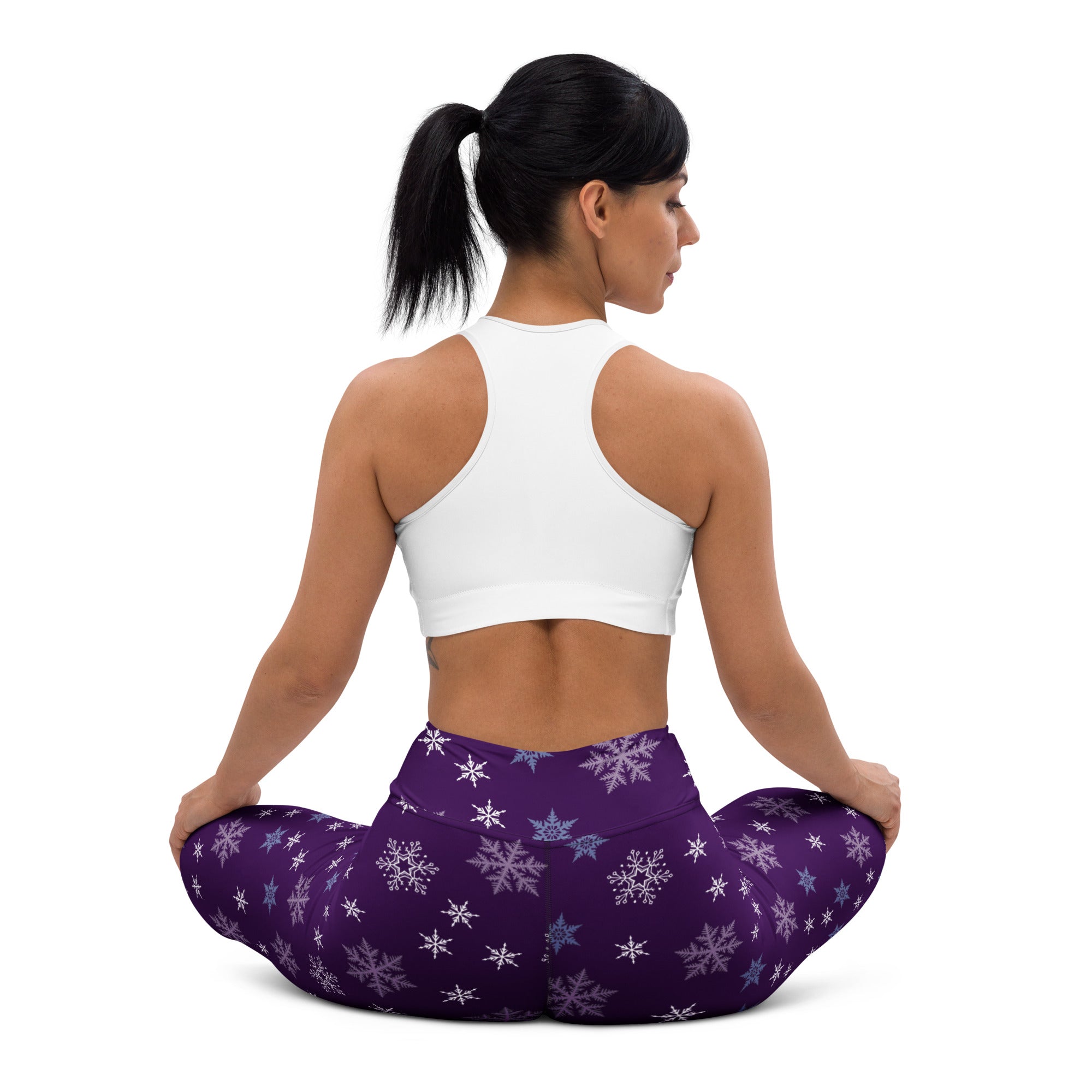 Women’s purple buttery soft yoga leggings with white and light blue snowflake pattern