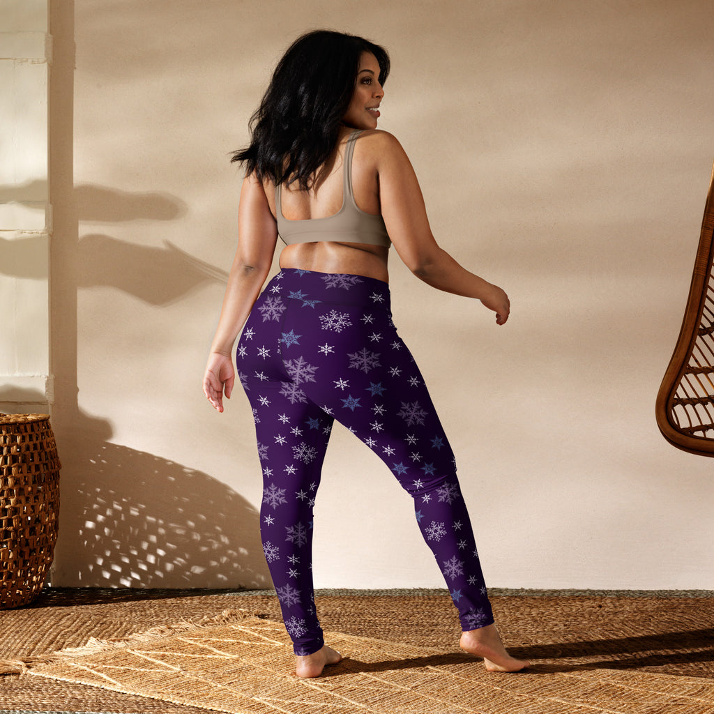 Women’s purple snowflake buttery soft yoga leggings with white and light blue snowflake pattern