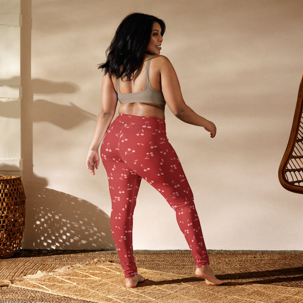 Women’s red cherry print high-waisted buttery soft leggings suitable for yoga and active wear