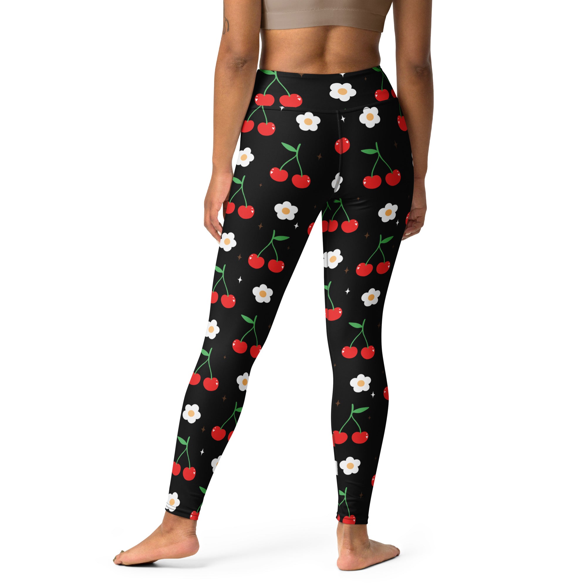 Women’s black cherry blossom buttery soft high-waisted yoga leggings with red cherries green stems and white flowers pattern