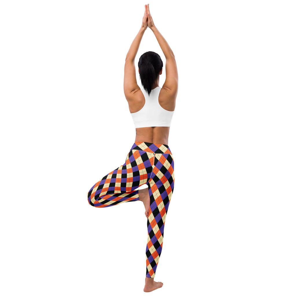 Women’s halloween argyle buttery soft yoga leggings in vibrant orange purple black and cream colors with a bold pattern