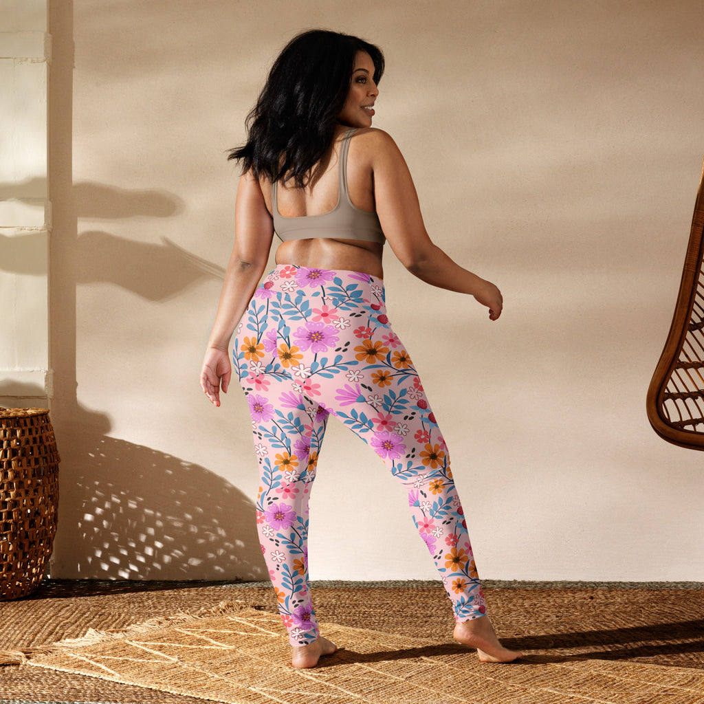 Women’s pink floral buttery soft yoga leggings with purple pattern high waistband made from stretchy fabric