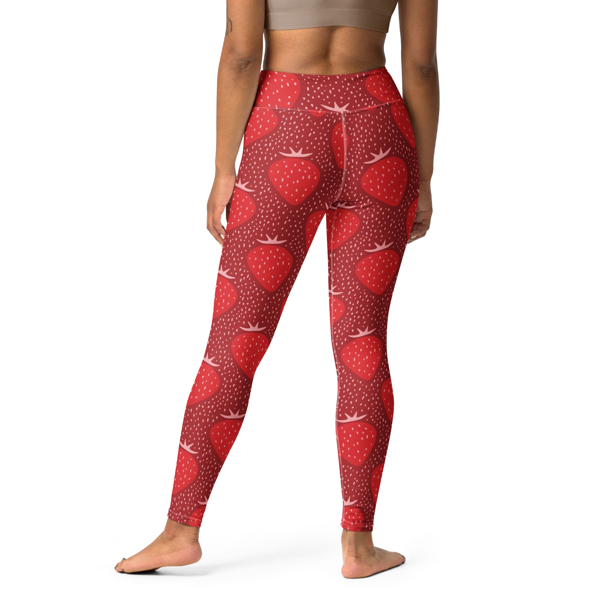 Red strawberry-patterned high-waisted women’s buttery soft yoga leggings with subtle dotted texture