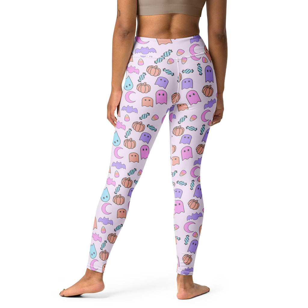 Women’s pastel-colored buttery soft yoga leggings with playful halloween ghost pumpkin bat and candy pattern