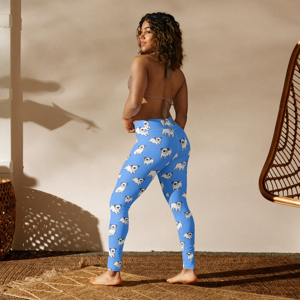 Women’s blue buttery soft yoga leggings with a repeating pattern of white pug faces