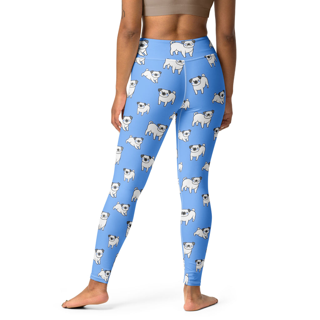 Women’s blue buttery soft yoga leggings with a repeating pattern of white cartoon pugs