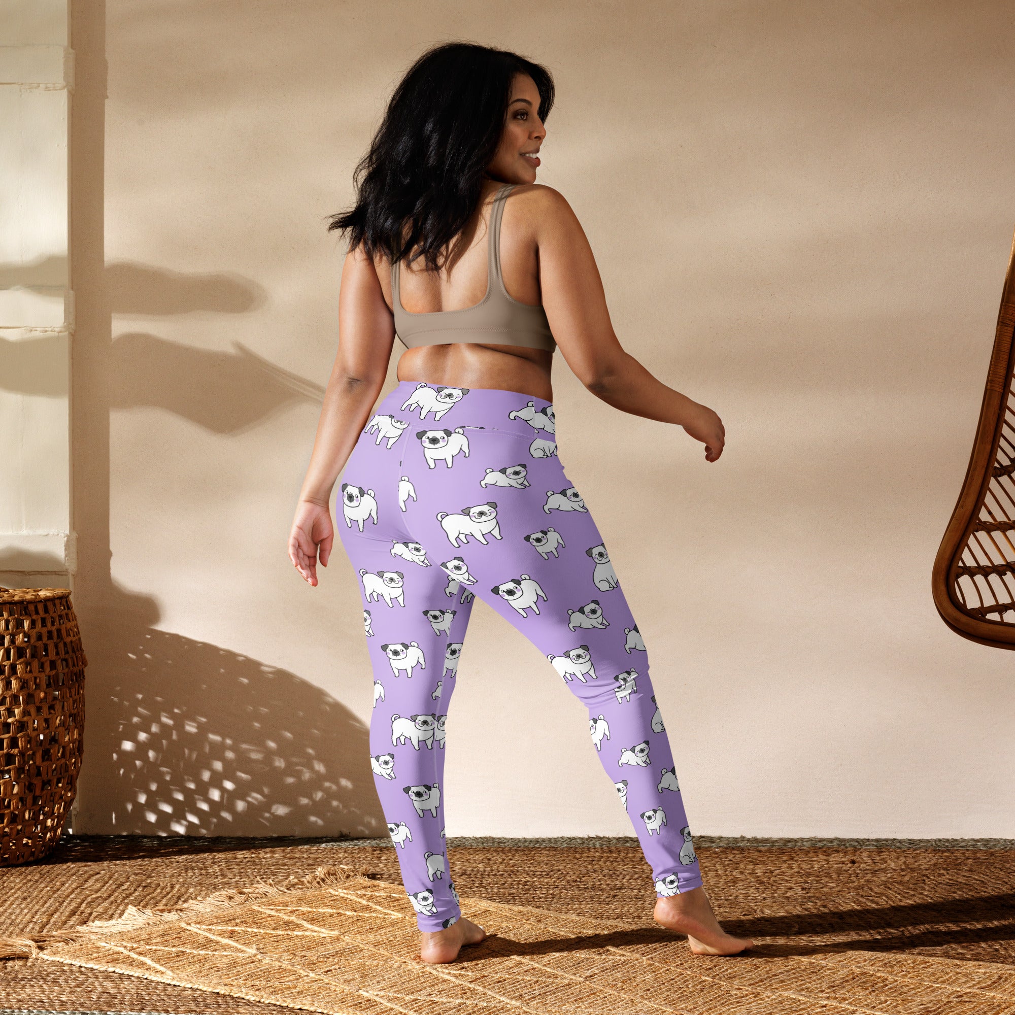 Women’s purple buttery soft yoga leggings with a playful white pug dog pattern