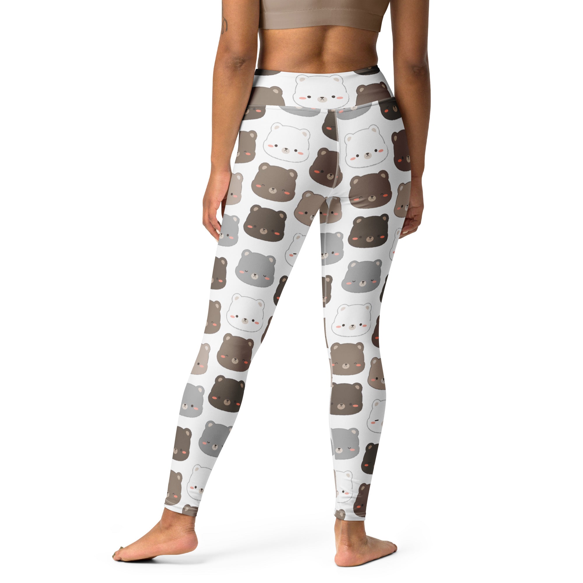 White buttery soft women’s yoga leggings featuring playful cartoon bears in shades of brown gray and white
