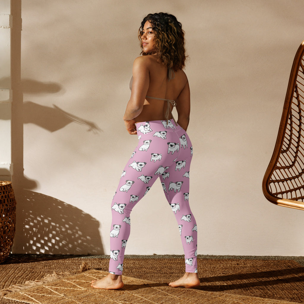 Women’s pink buttery soft yoga leggings with a repeating pattern of white pug illustrations