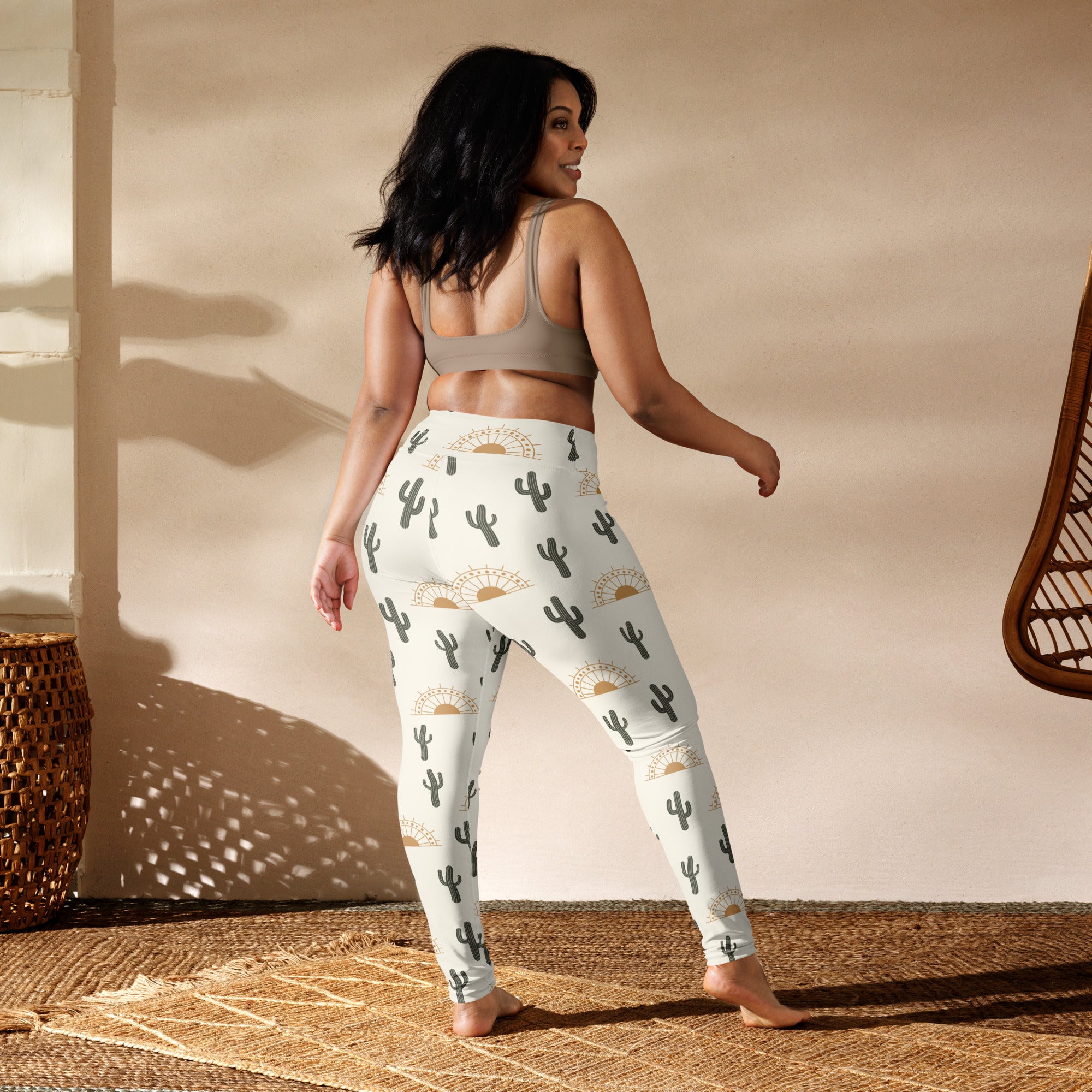 White buttery soft women’s yoga leggings with black cactus and gold sunburst desert sunrise pattern