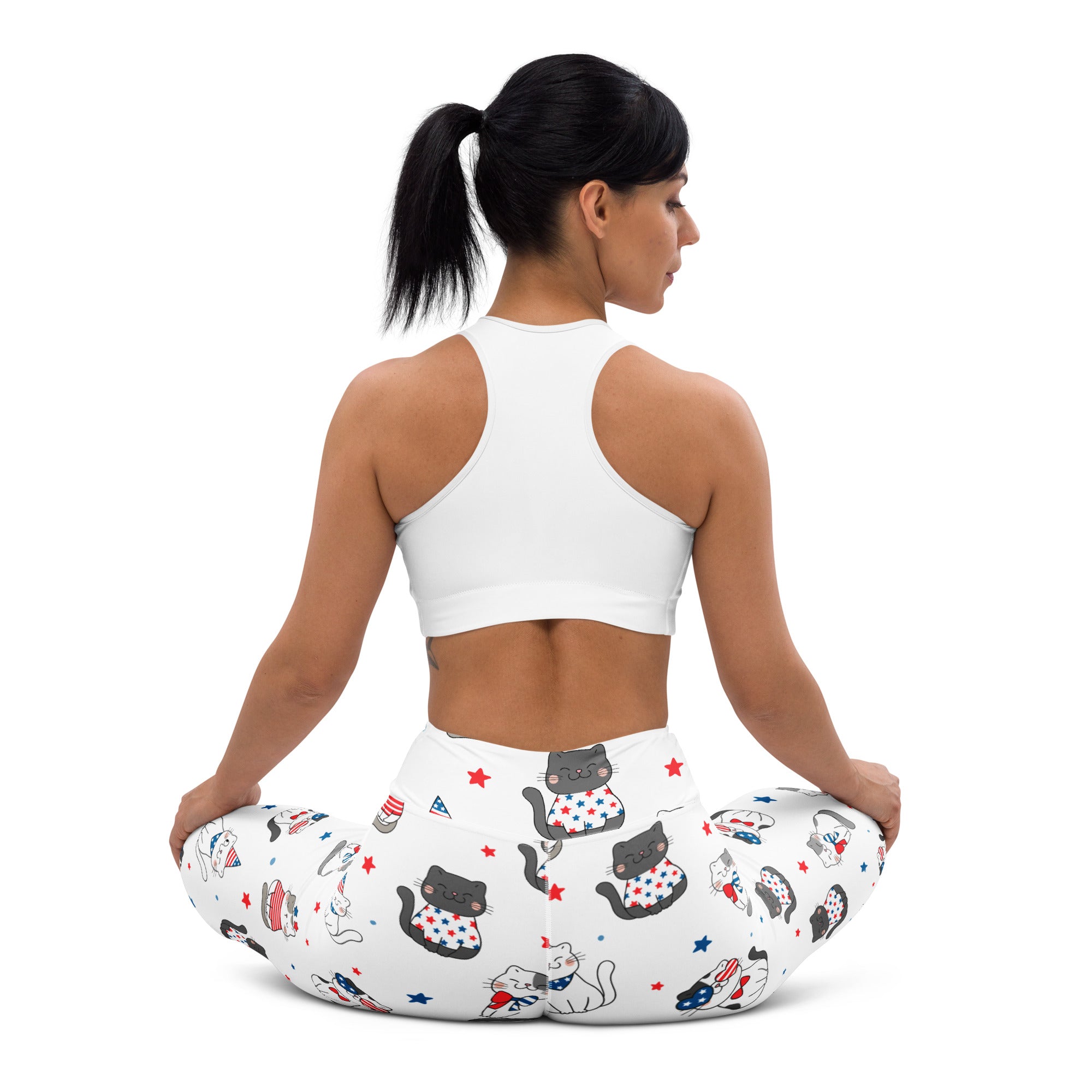 White women’s buttery soft yoga leggings with black cats in patriotic outfits and red white and blue stars pattern