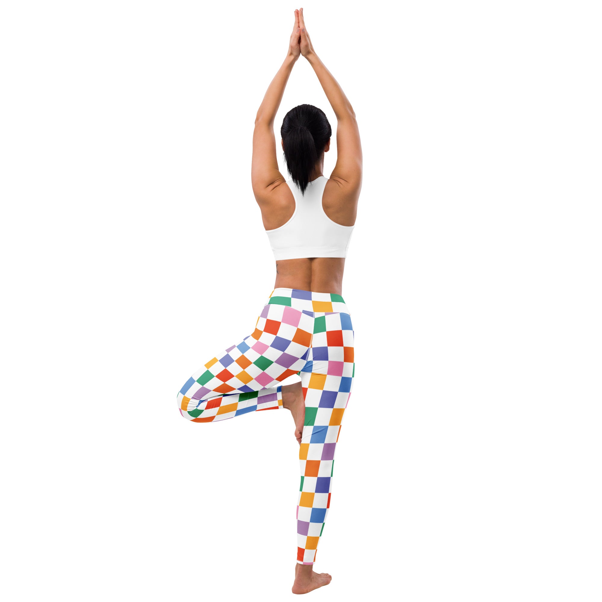 Women’s colorful checkered buttery soft yoga leggings with a vibrant rainbow pattern for active wear