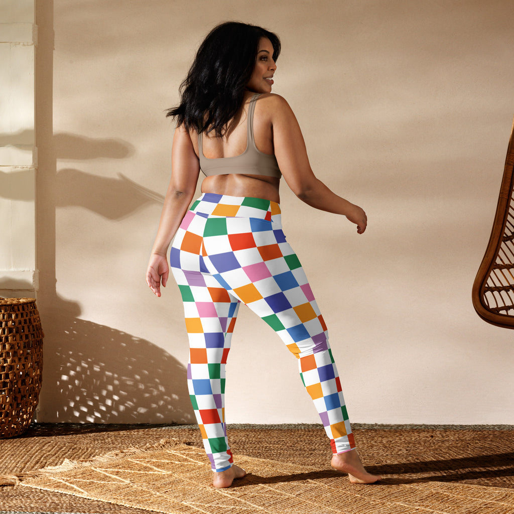 Women’s colorful checkered buttery soft yoga leggings with a vibrant rainbow pattern for active wear