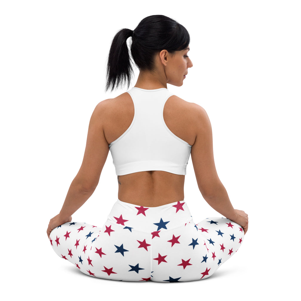 White buttery soft women’s yoga leggings with red and blue star pattern perfect for comfortable workouts