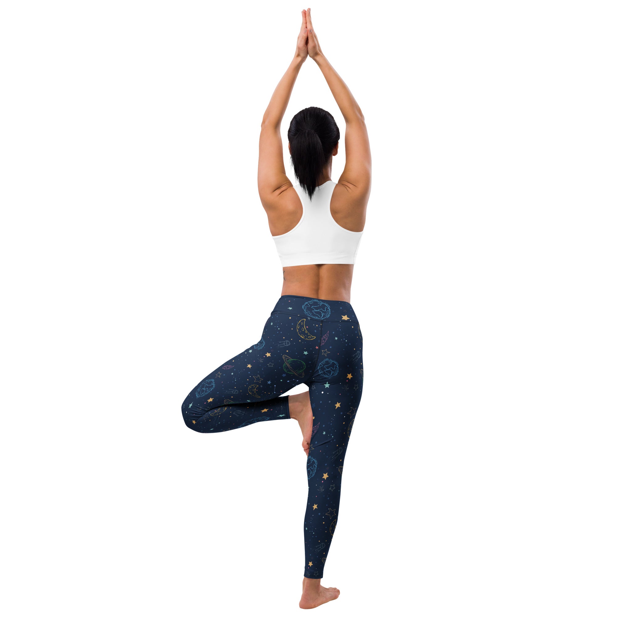 Women’s dark blue buttery soft yoga leggings with colorful celestial moons stars and planets pattern