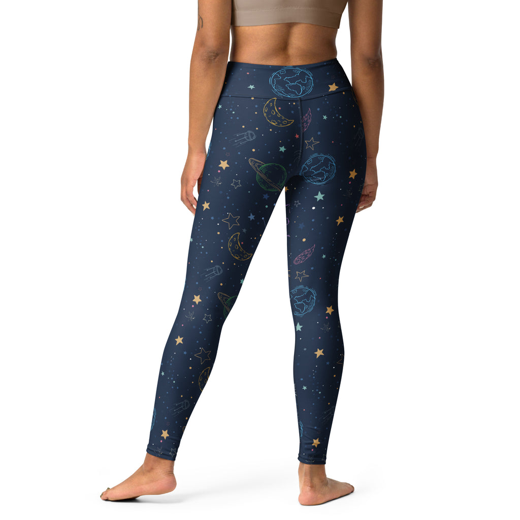 Dark blue high-waisted buttery soft yoga leggings with colorful cosmic planet and constellation design for women