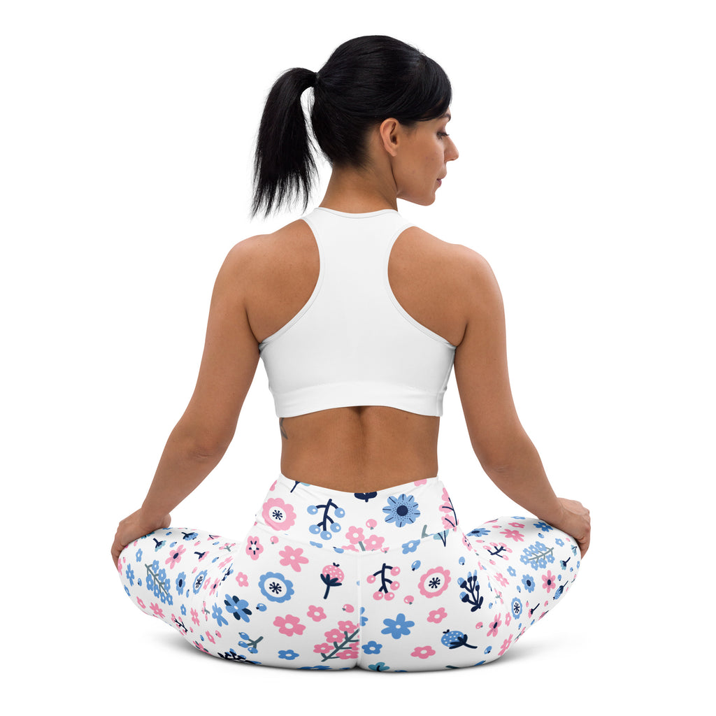 Women’s pastel floral buttery soft yoga leggings in white with pink and blue flowers on stretchy fabric