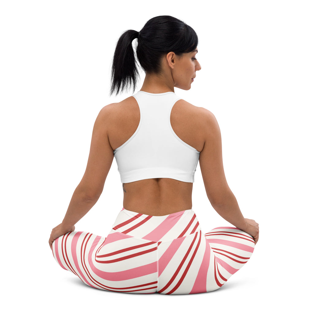 Women’s candy cane stripe buttery soft yoga leggings featuring pink and white striped swirling pattern