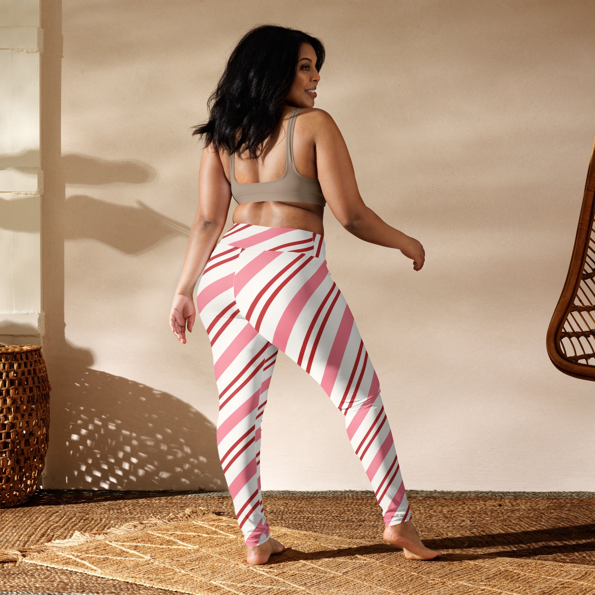 Women’s candy cane stripe buttery soft yoga leggings with pink and white high-waisted striped design