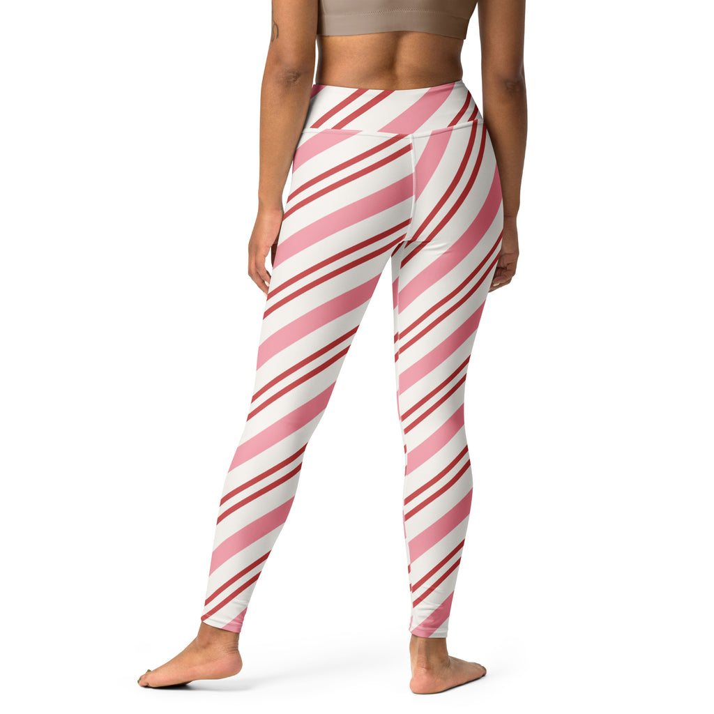 Women’s buttery soft high-waisted yoga leggings with pink and white candy cane stripe design