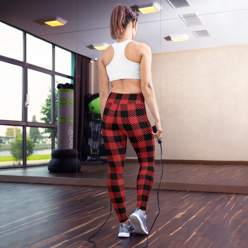 Women’s red buffalo plaid buttery soft yoga leggings in red and black shown from the back side
