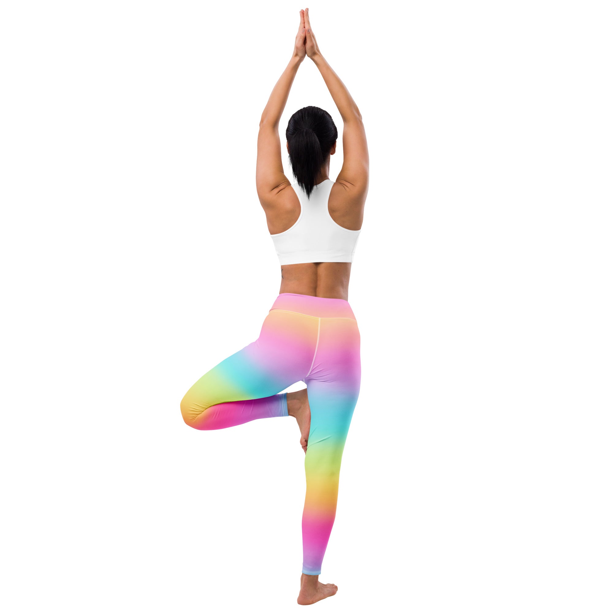 Women’s bright rainbow buttery soft yoga leggings in a smooth stretchy fabric with a rainbow gradient design