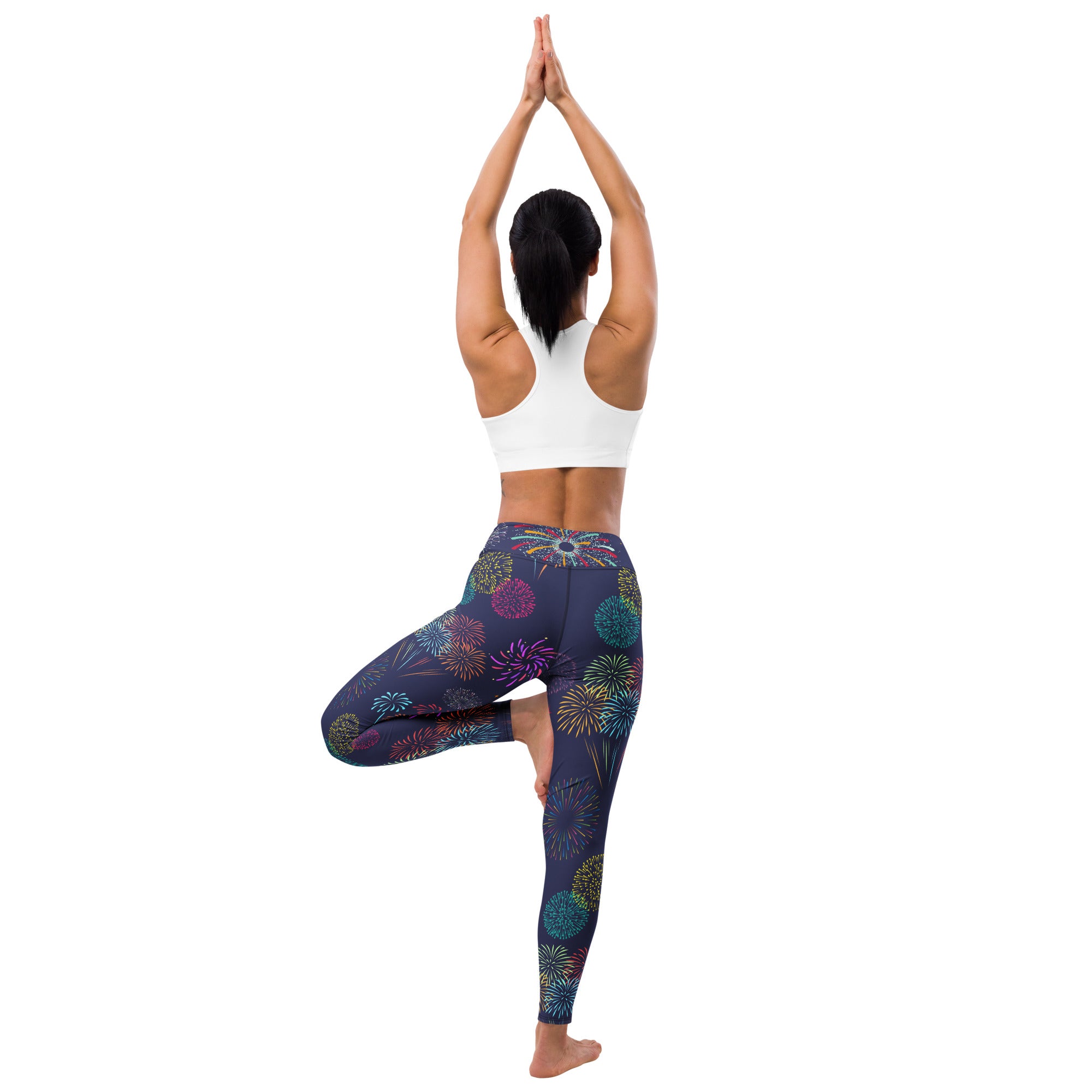 Dark blue buttery soft women’s yoga leggings with a vibrant multicolored fireworks pattern