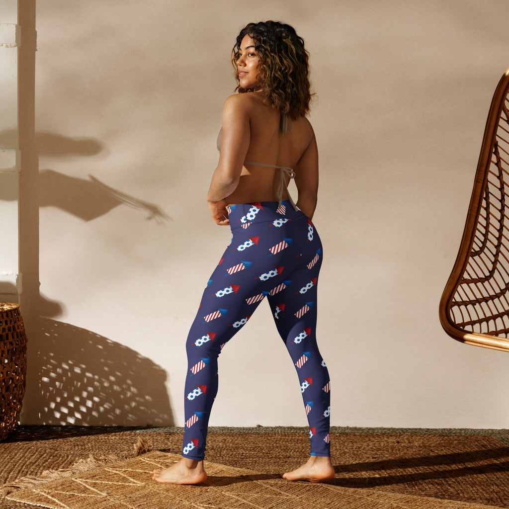 Navy blue buttery soft women’s yoga leggings with red white and blue rocket ship pattern for 4th of July